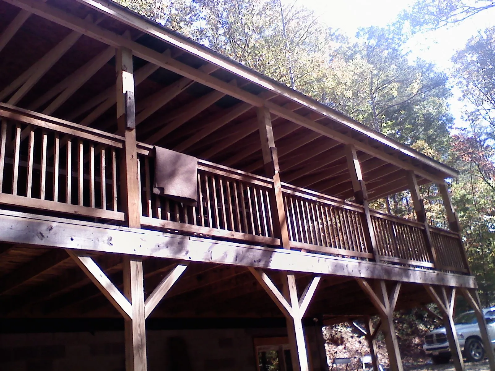 Timber framing under a new elevated porch and deck — Roof Leak Repair in Rumney by Roofing Brothers